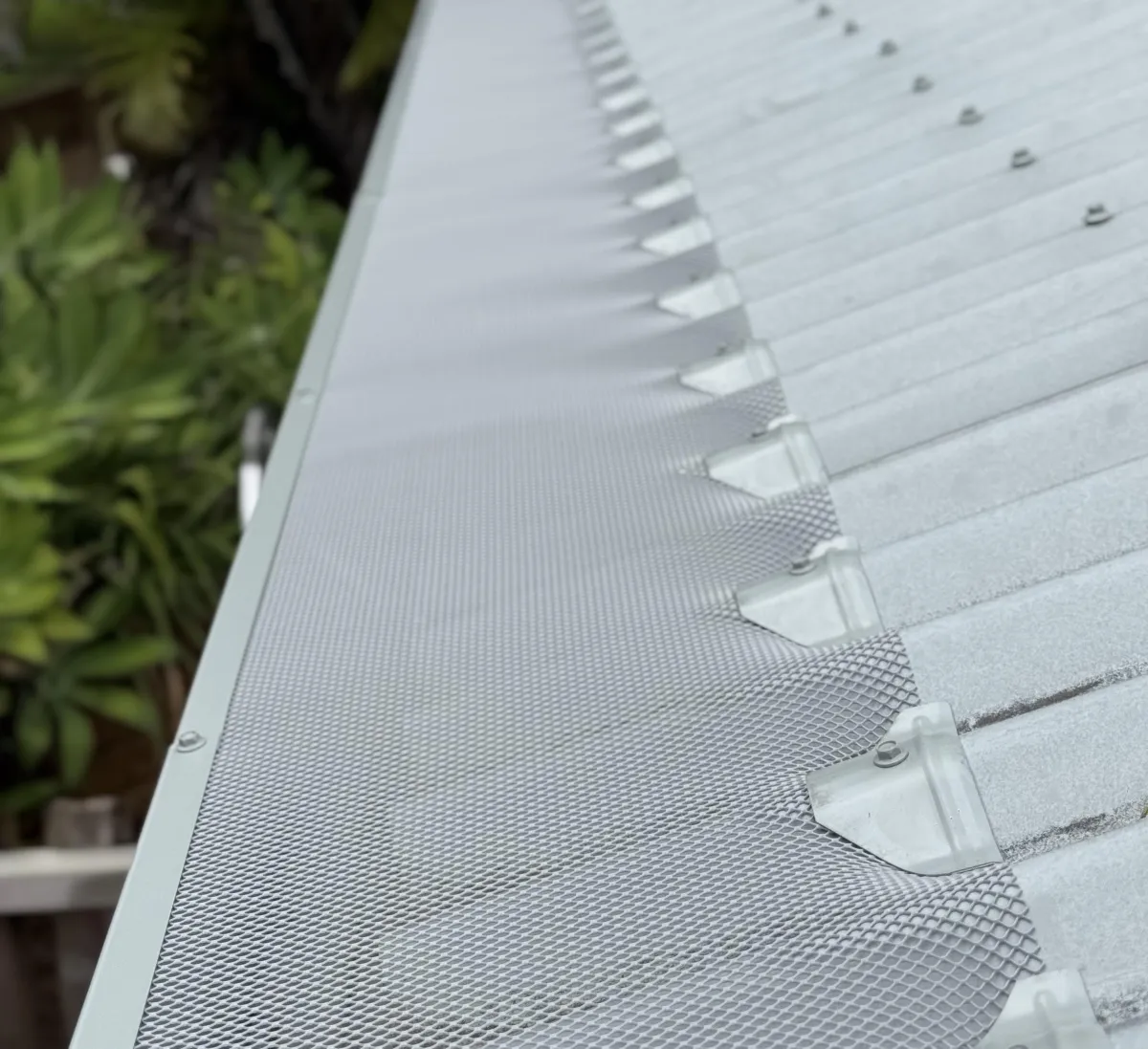 Plastic Gutter Guard Installation On Tile Roof