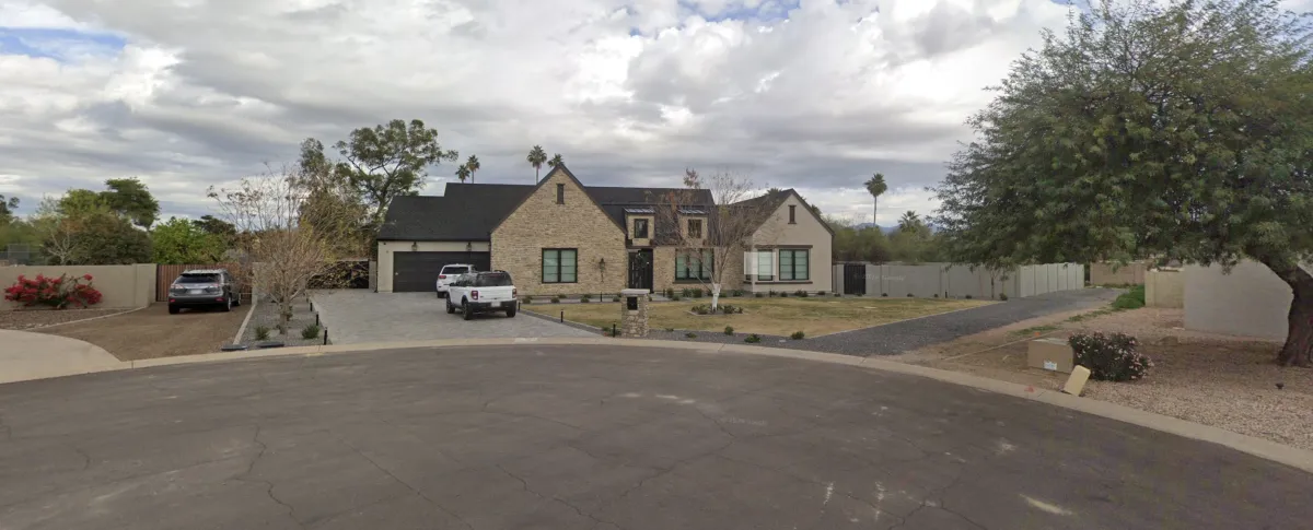 A cool-toned desaturated view of a static real estate property indicating a stalled deal