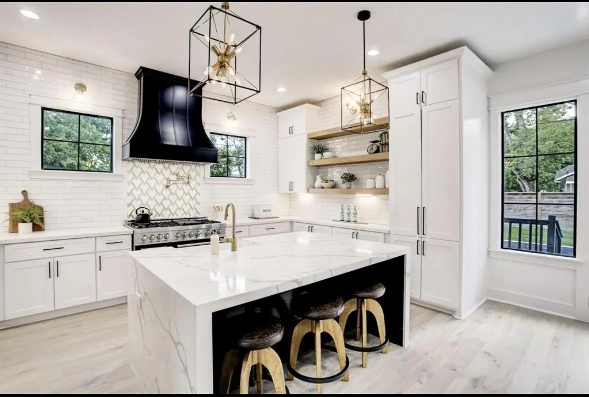 Luxury Scottsdale kitchen remodel with natural stone island and warm lighting