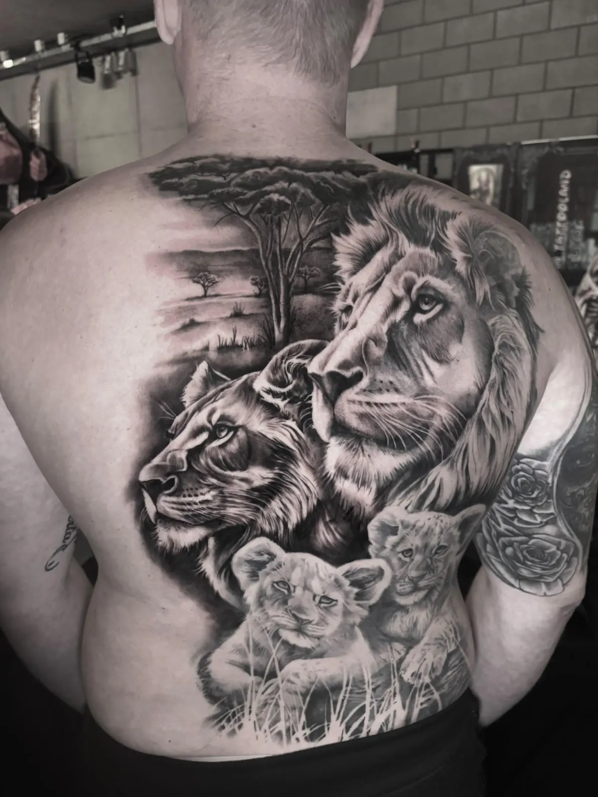 person with tattoo on right arm