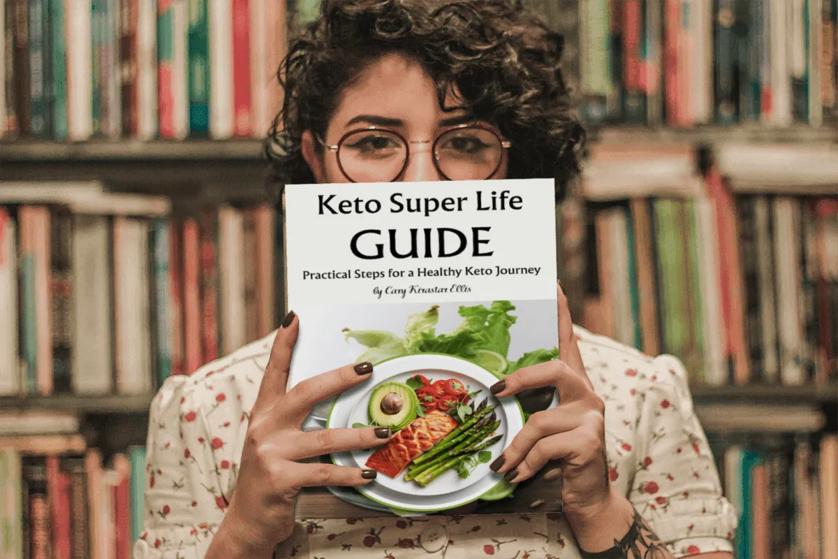 woman holding Keto SuperLife Guide