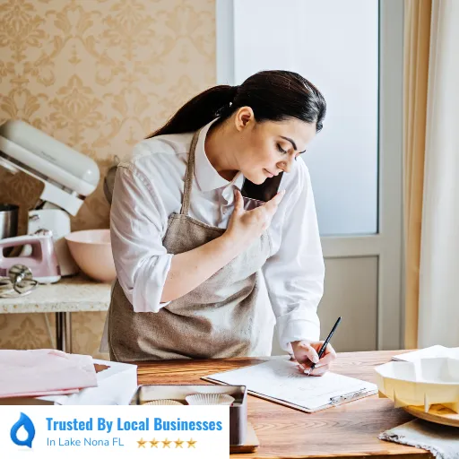 Happy Lake Nona business owner working confidently inside of their thriving local business after partnering with Living Logos Media for digital marketing serviceso