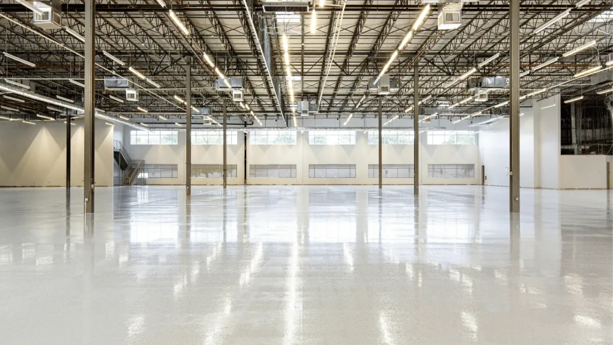 Dowers Power Wash commercial warehouse floor pressure washing removing industrial grease and debris in Olympia WA