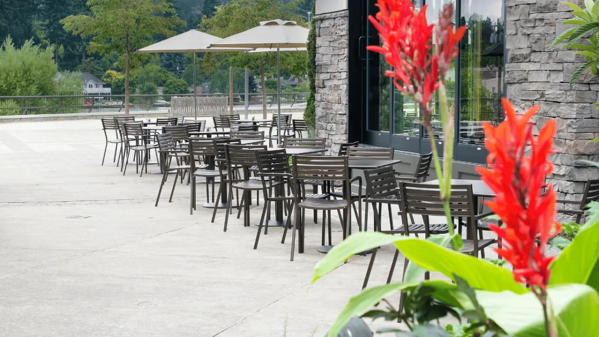 Professional outdoor dining patio cleaning service in Olympia WA by Dowers Power Wash LLC removing food stains and moss