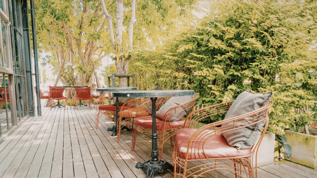 Professional outdoor dining patio cleaning service in Olympia WA by Dowers Power Wash LLC removing food stains and moss