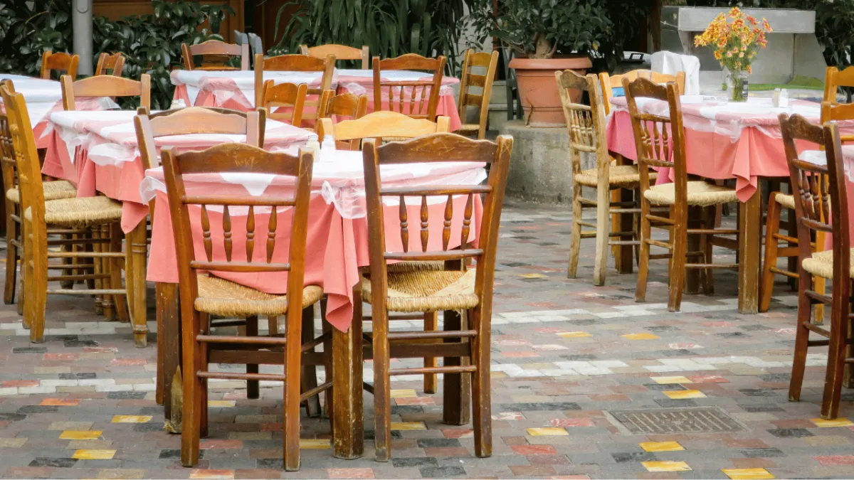 Professional outdoor dining patio cleaning service in Olympia WA by Dowers Power Wash LLC removing food stains and moss