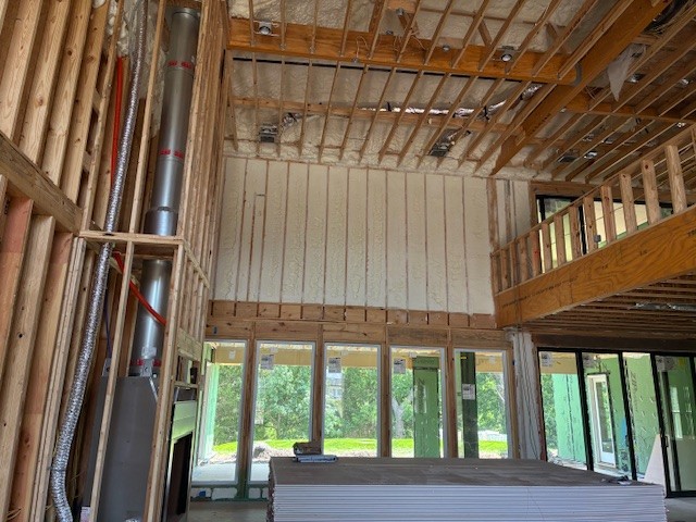 man holding incandescent bulb