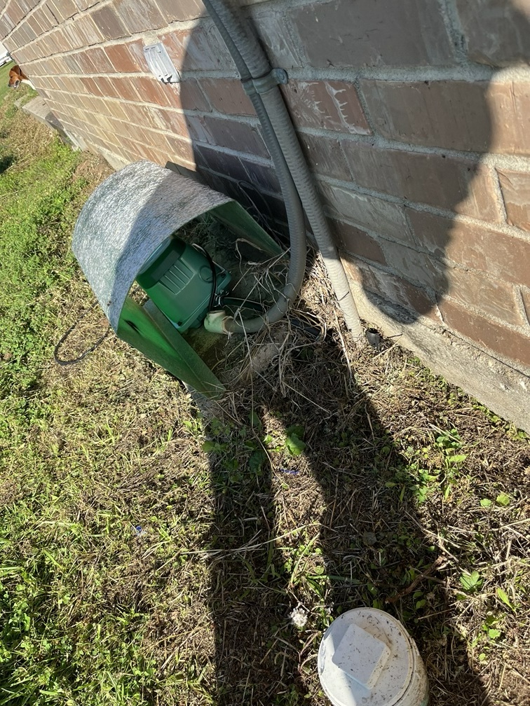 a person holding their hands under a stream of water