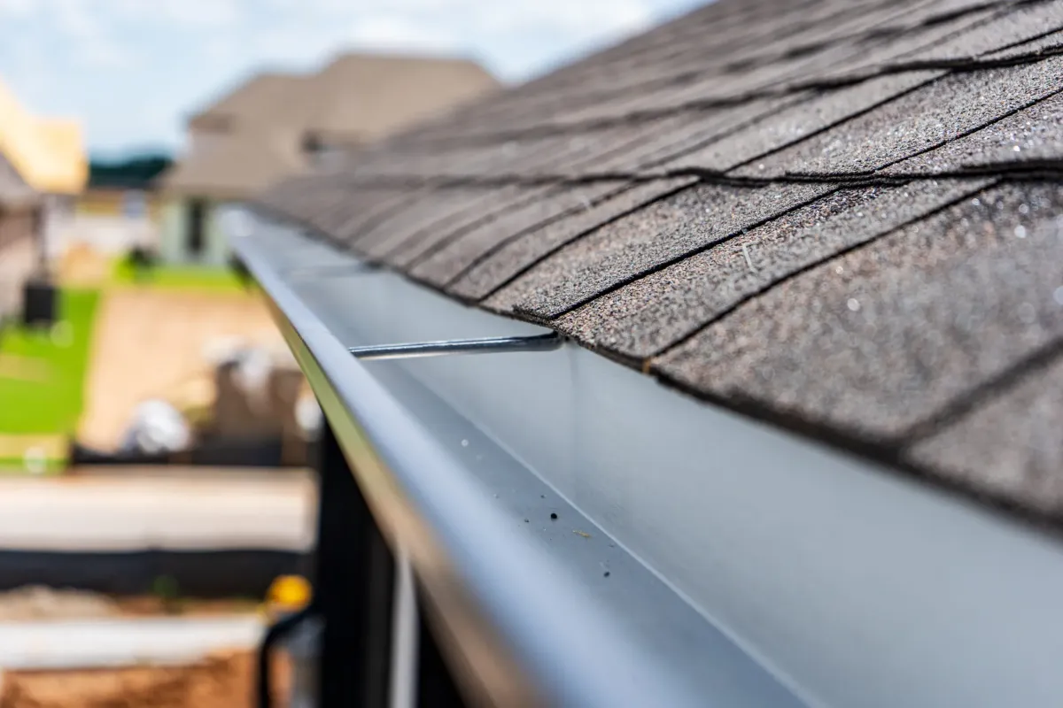 a newly installed gutter of a house