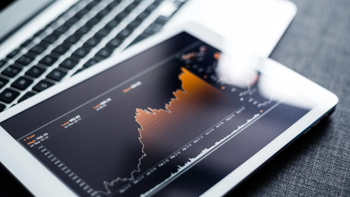 a group of dices floating on top of a body of water