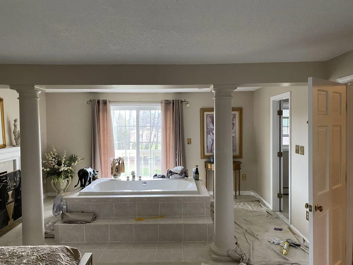 white robot near brown wall