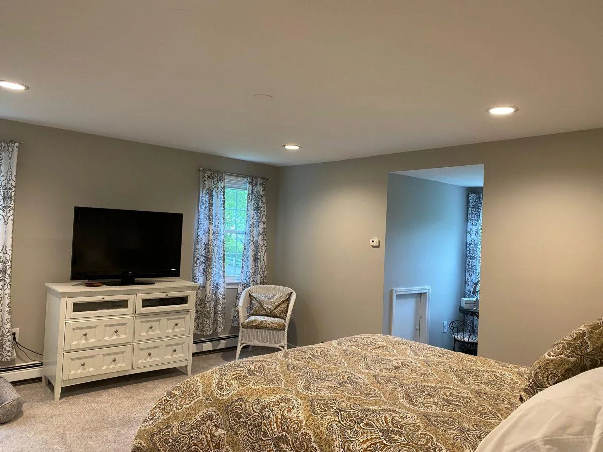 person holding orange flower petals