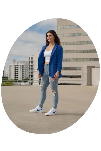 Picture of Nicole in blue blazer on top of building