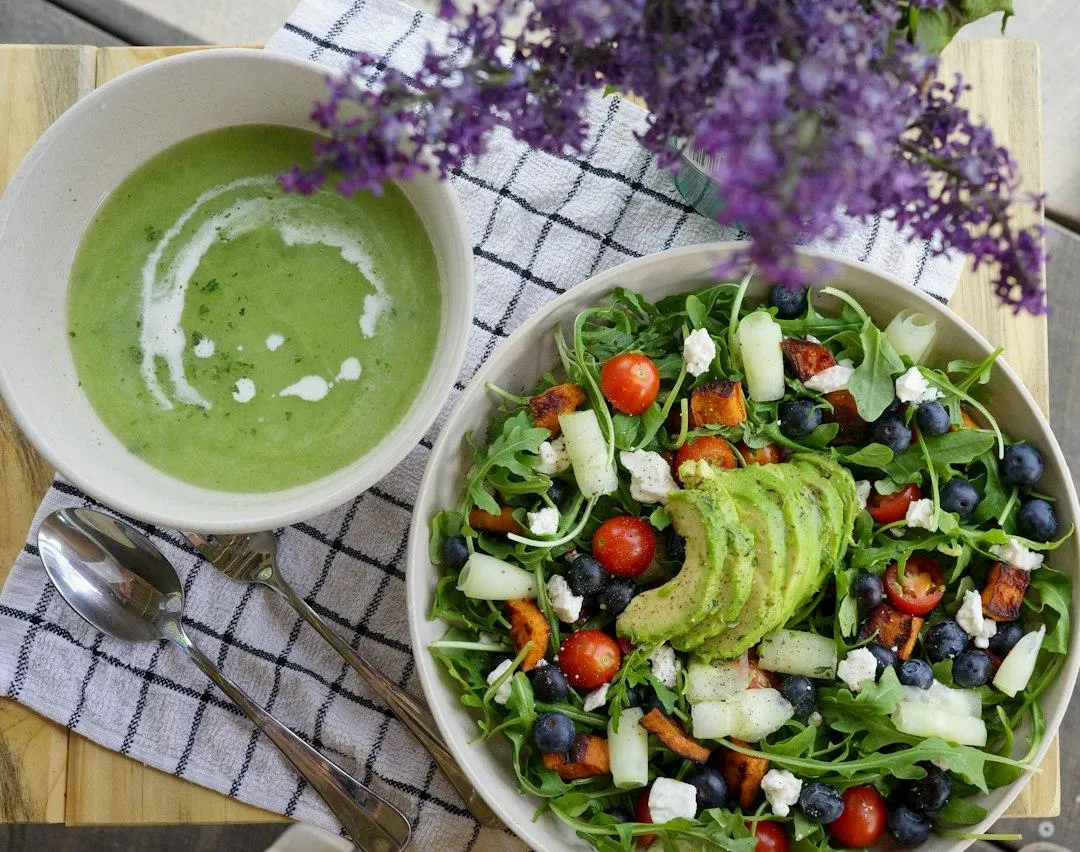 Fresh gourmet salad and warm soup lunch pairing