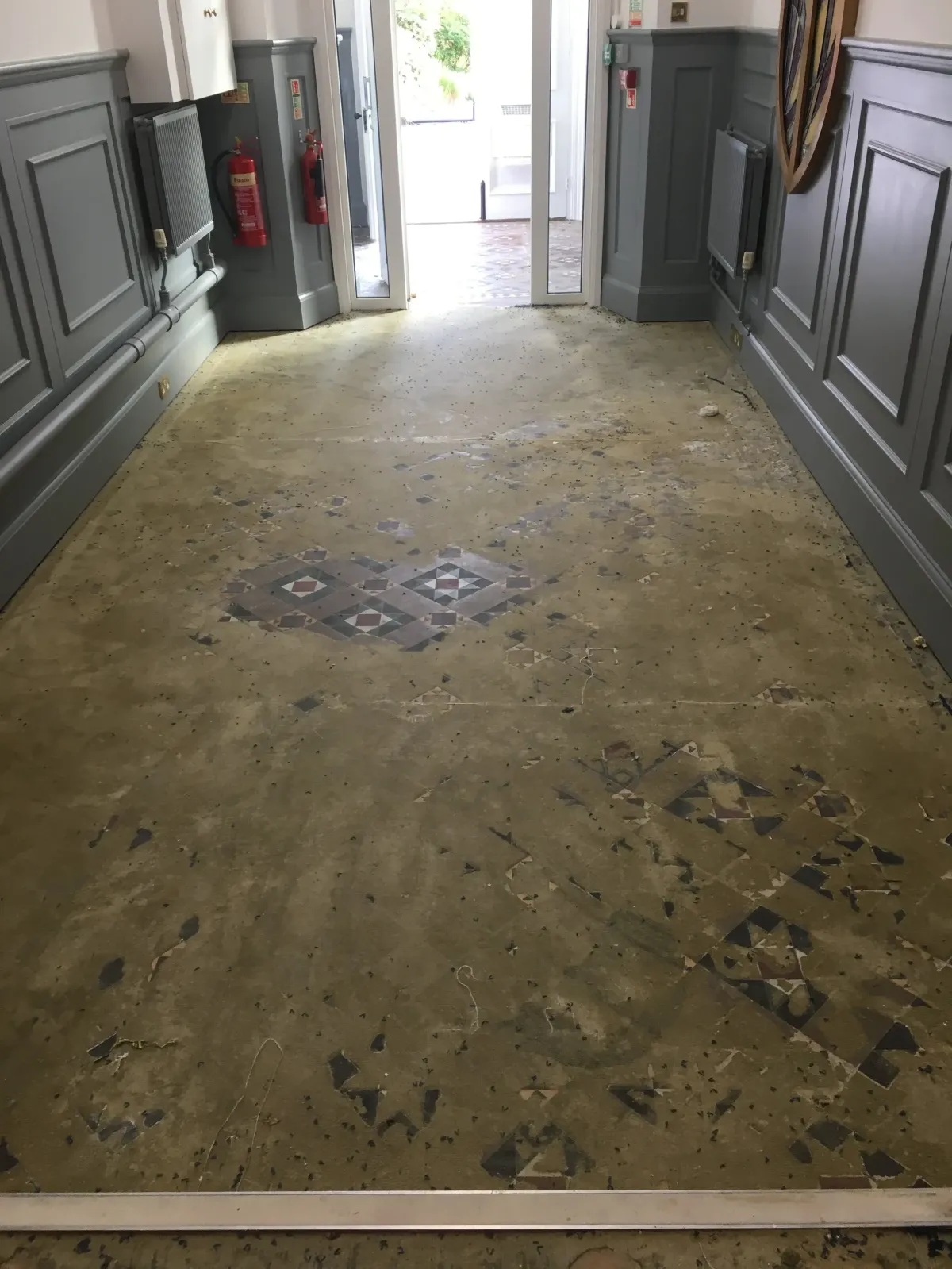 Macro view of severely stained and dirty grout lines between tiles