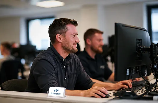 Business professionals evaluating an IT partner for reliable technology support, cybersecurity, and managed IT services
