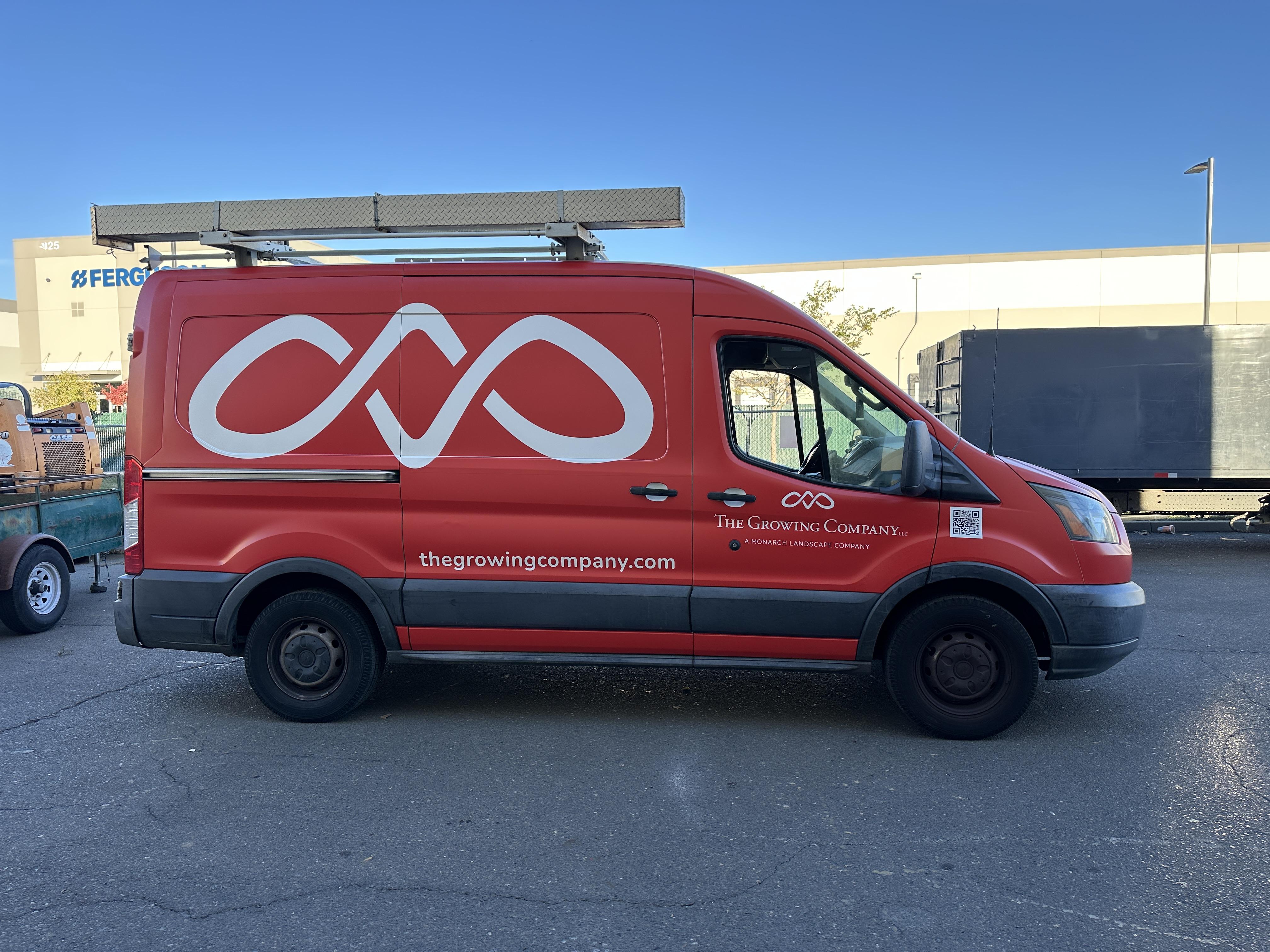 Designer planning a custom PPF application for a sports car at AC Wraps