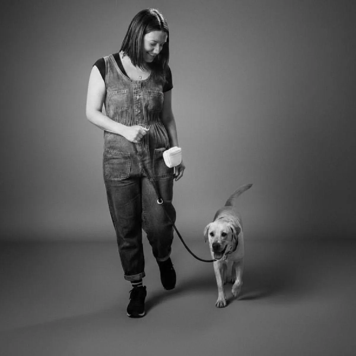 Confident puppy outdoors with family