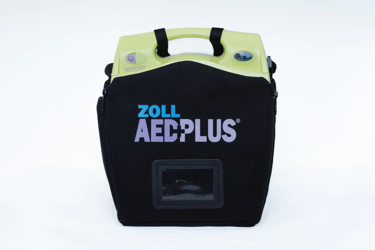 Zoll AED Plus inside of black carying case with Zoll AED Plus written on the utside of the black bag
