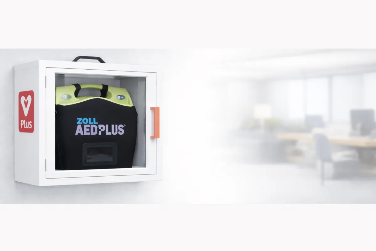 AED hanging on white wall in a commercial business office