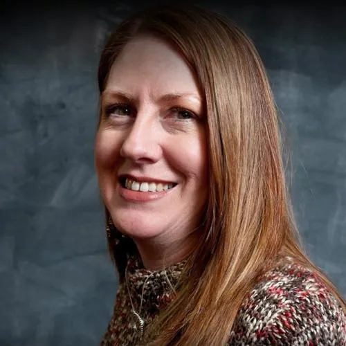 brown rattan swing bench with cushions