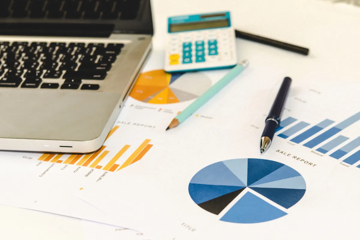 Financial Planning wit pie chart and laptop