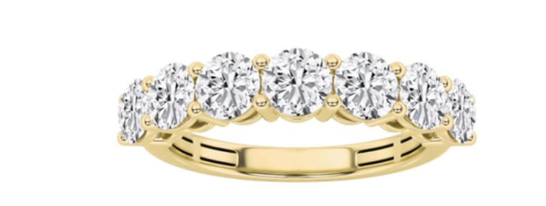 a large jetliner flying through a cloudy blue sky