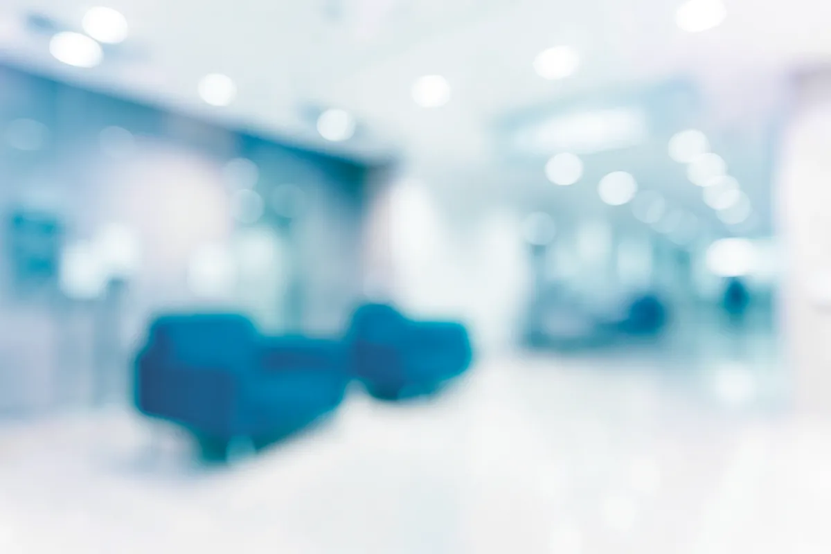 person injecting someone on his arm