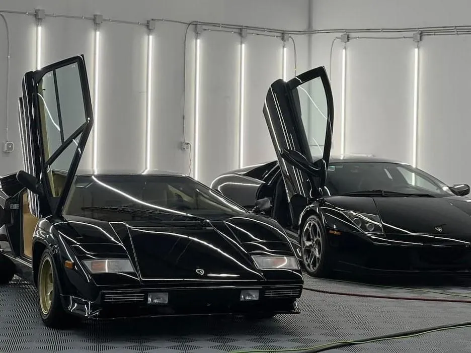Full XPEL paint protection film on a classic and a brand new Lambo parked next to each other 