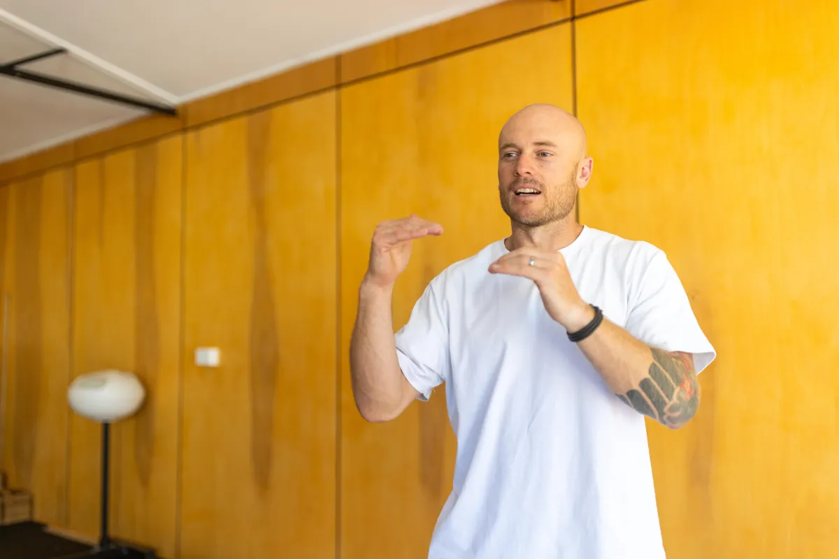 a pair of pink and black dumbs on a blue background