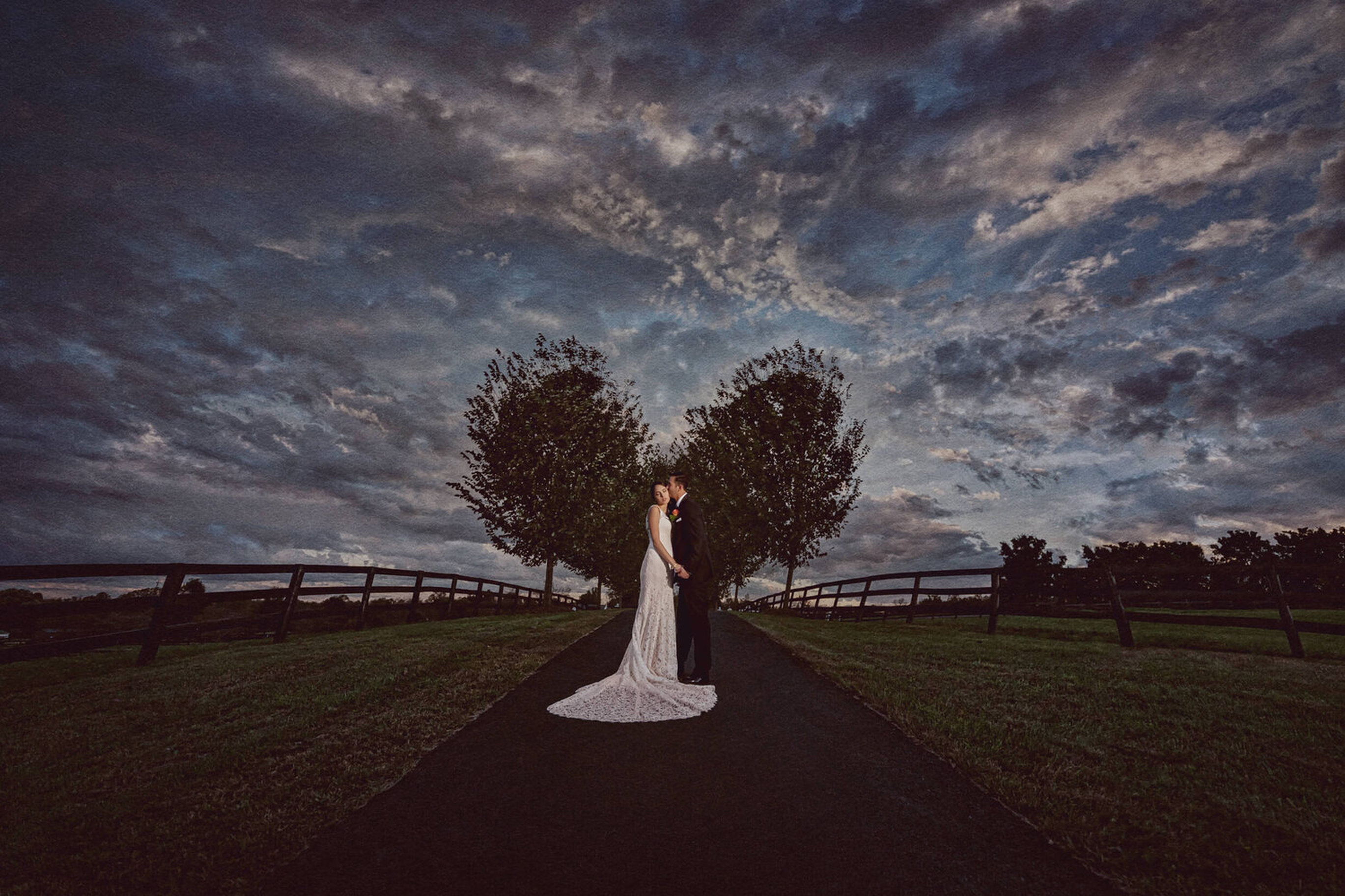 Washington D.C. wedding photography - couple under a dramatic sky at dusk