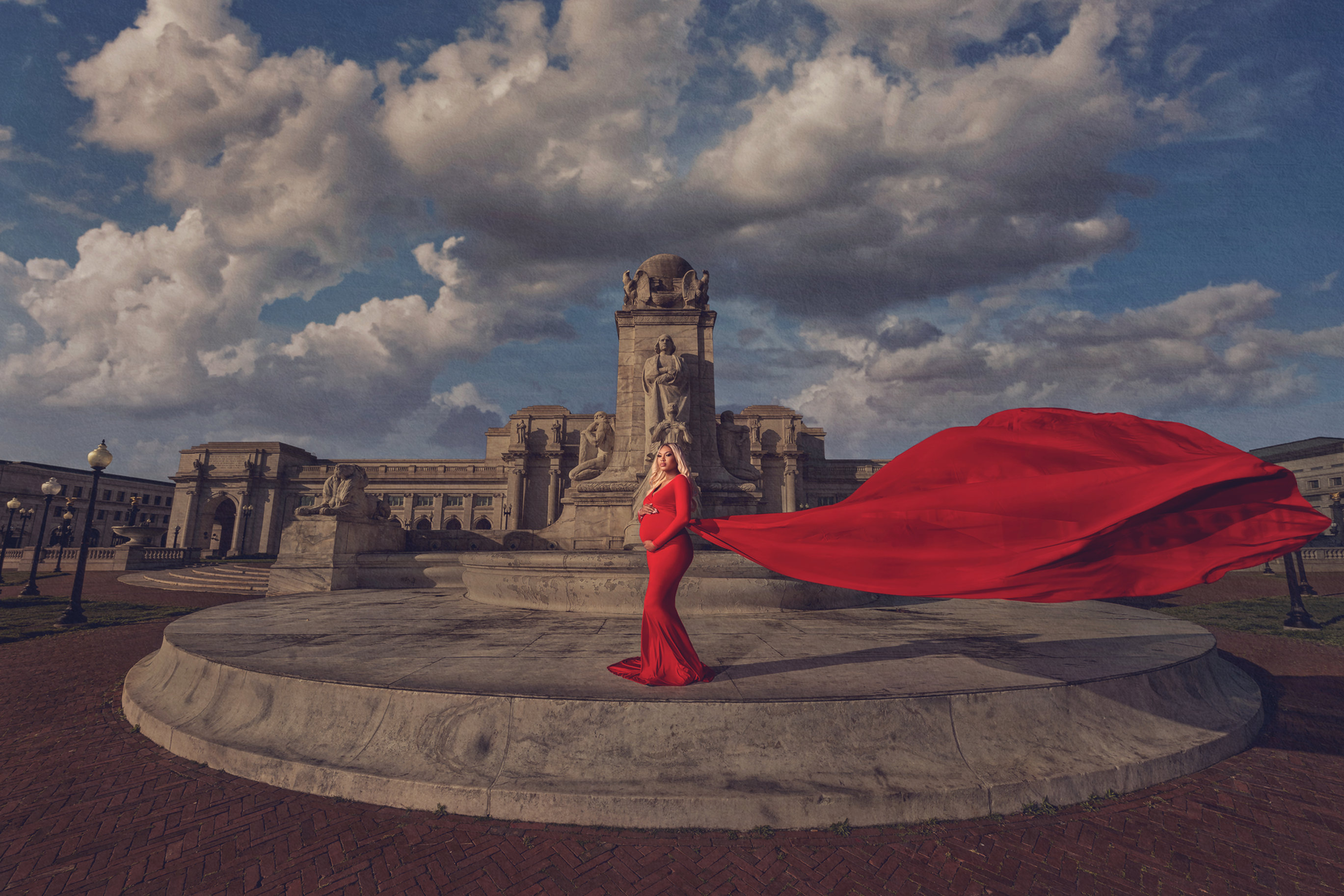 Washington D.C. maternity photography - expectant mother in a red gown at a D.C. memorial