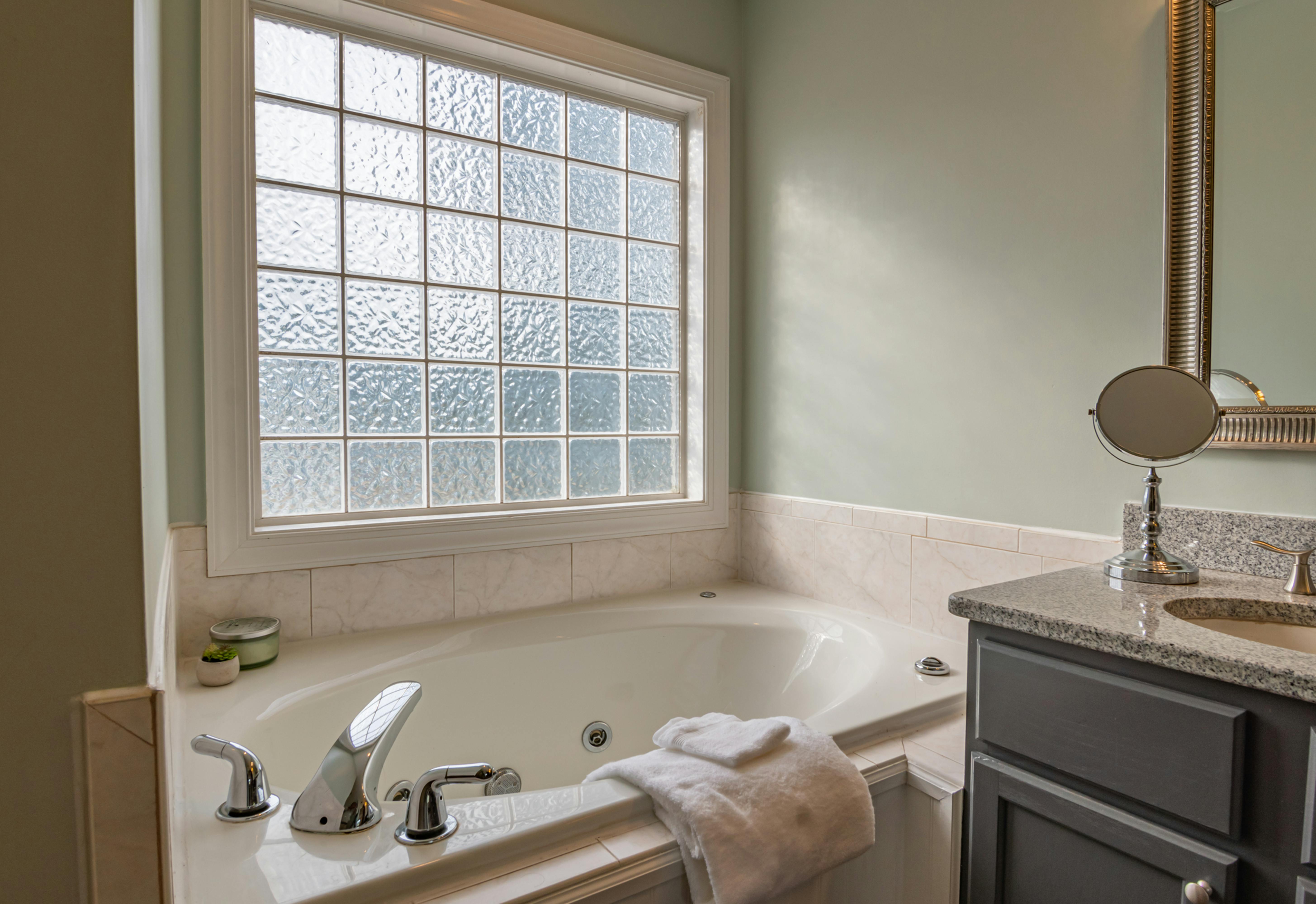 bathtub with glazed windows