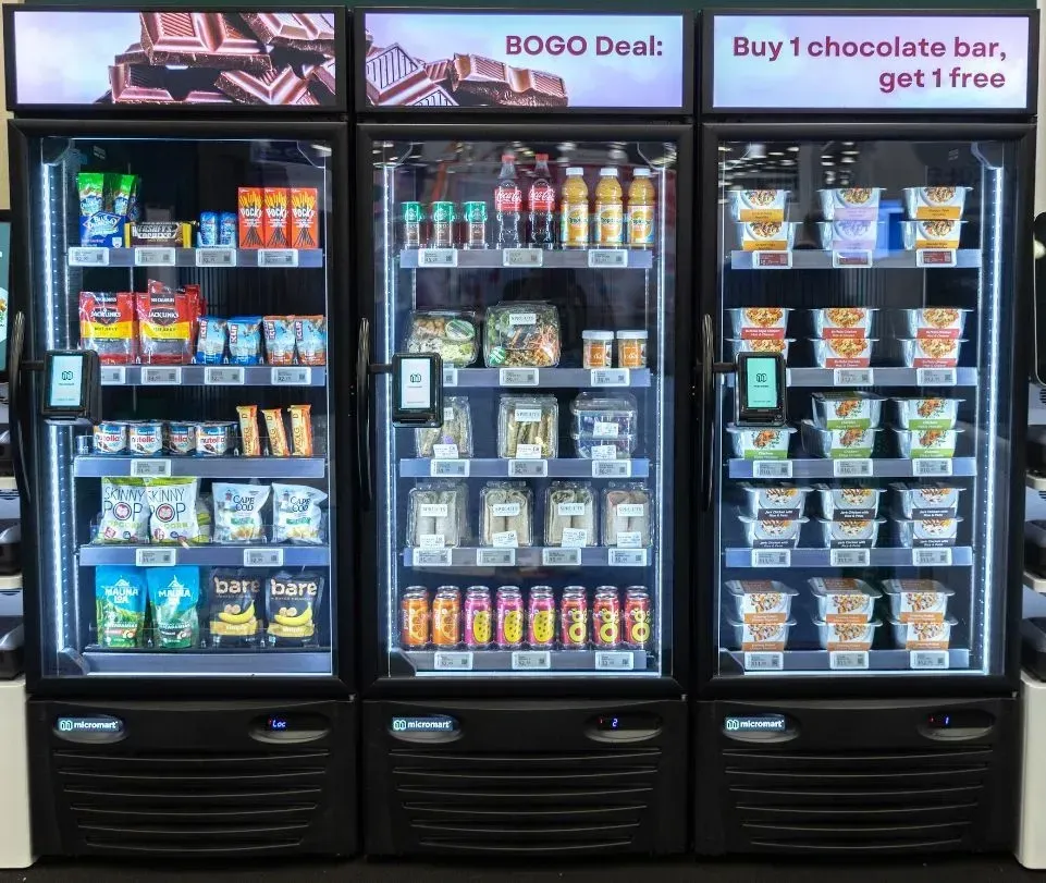 Vending machine overflowing with various treats.
