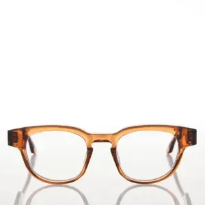 Bold eyewear frame in amber color showcasing a trendy design, part of the Enjoy Optical collection.