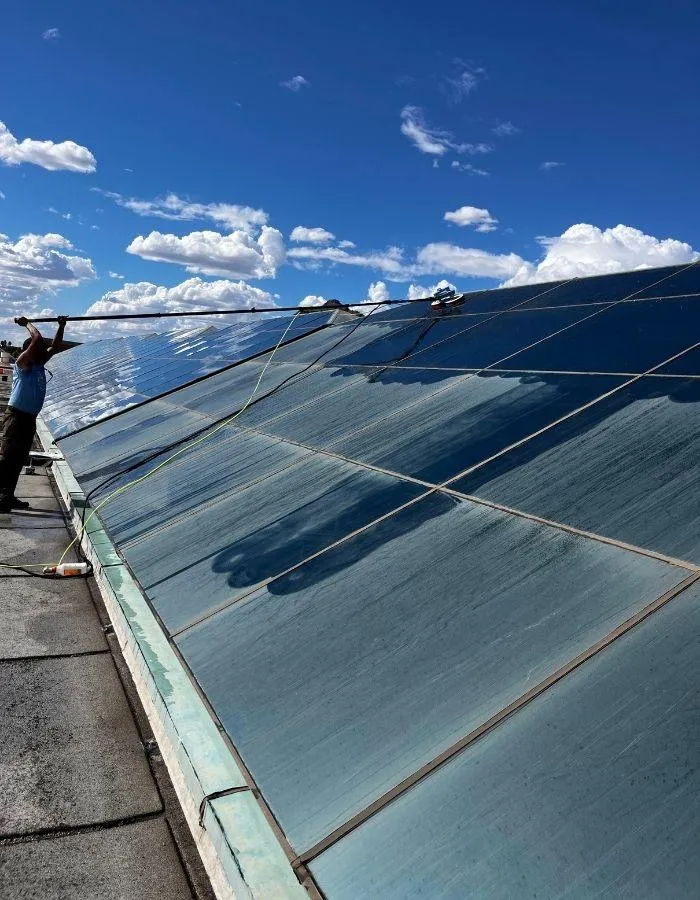 Spotless interior view of three windows with white trim showing blue sky through crystal clear glass