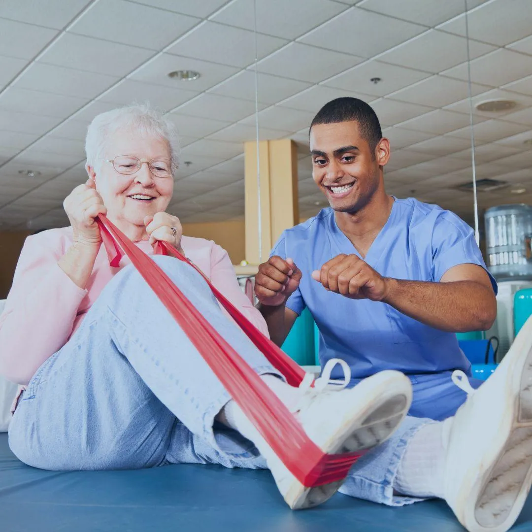 Physical therapist working with patient