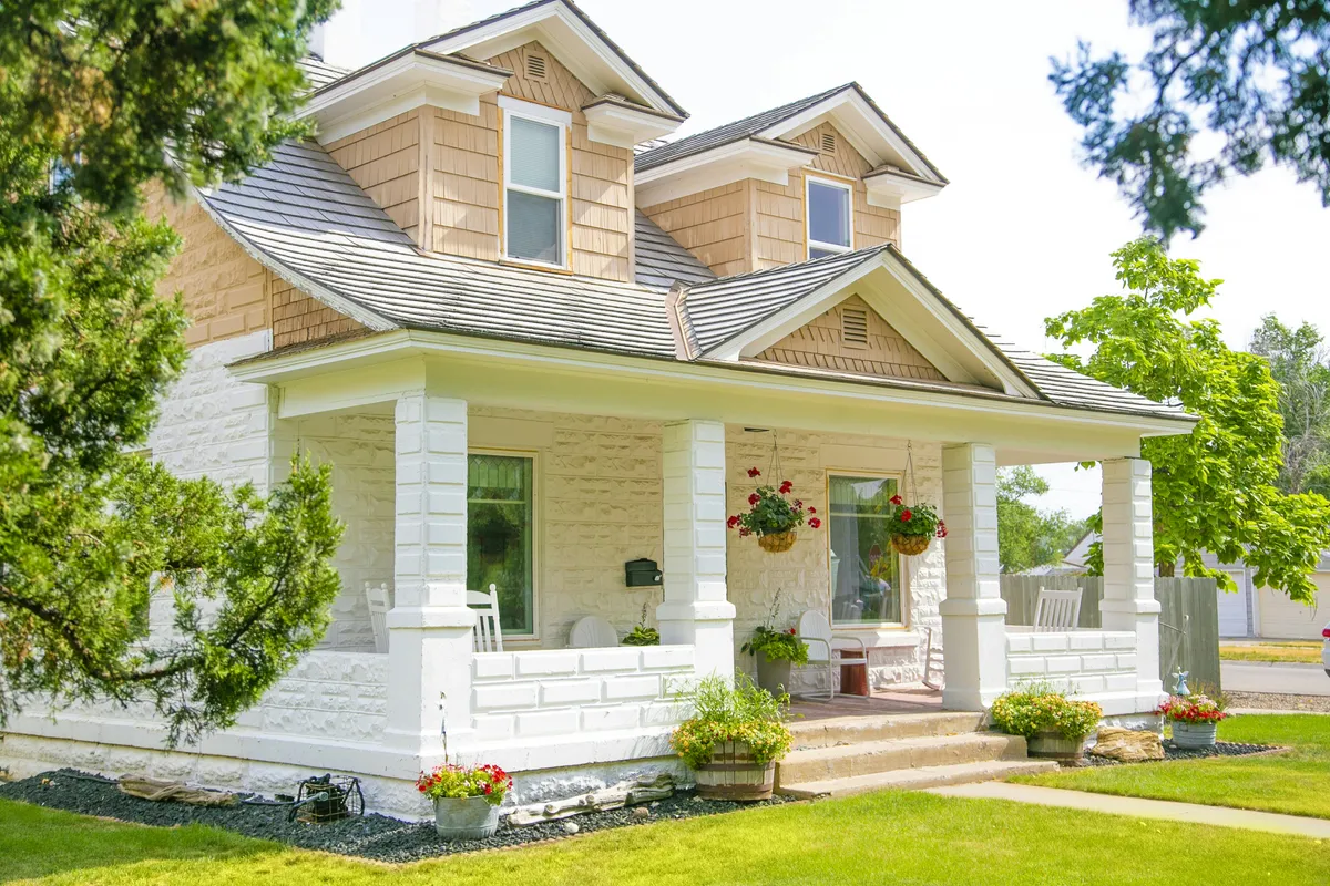 Photo of gorgous new home listing with pretty yard and architecture