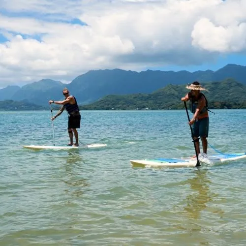 2 Guys Paddle Boarding at Secret Island