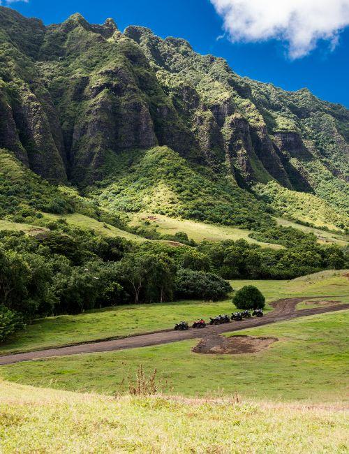 View of UTVs in Kualoa Valley Raptor Tour