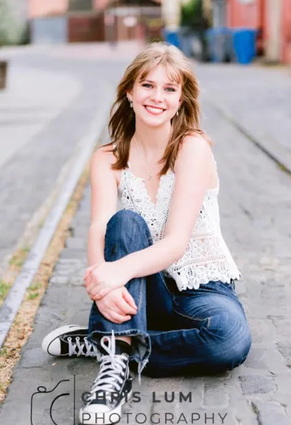 Studio-style portrait of co-host R. Morgan