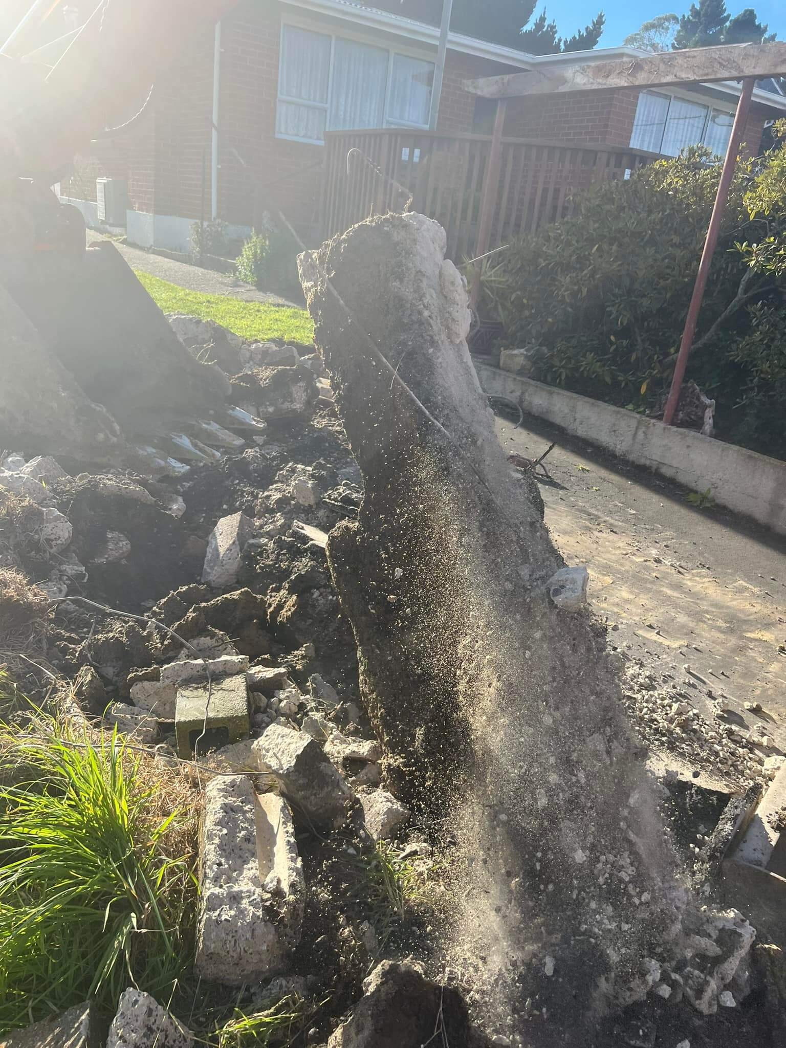Augering and hole drilling services for construction and fencing projects in Dunedin