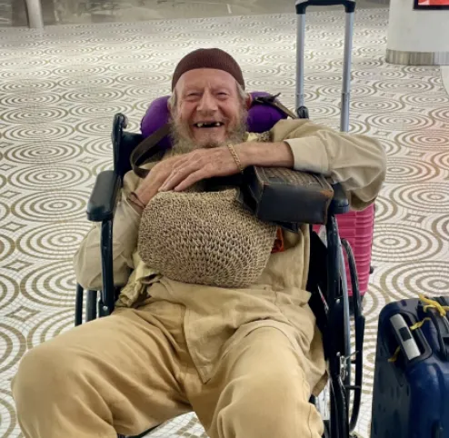 Overlapping landscape photo of a cooperative water-harvesting project with a multi-generational team inspecting systems at sunset, warm tones, high-quality editorial photography showing long-term vision and collaboration.