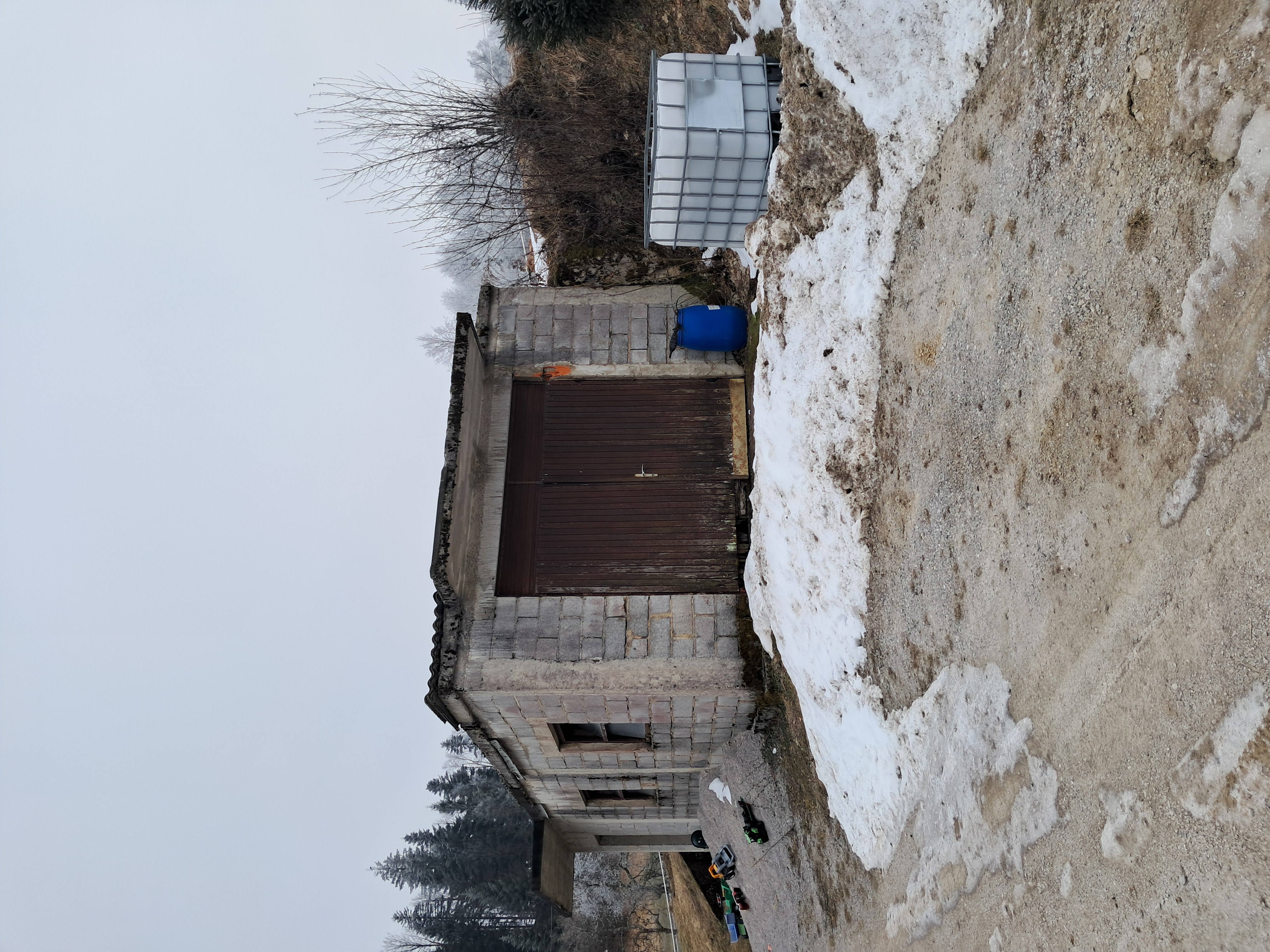 Overlapping landscape photo of a cooperative water-harvesting project with a multi-generational team inspecting systems at sunset, warm tones, high-quality editorial photography showing long-term vision and collaboration.