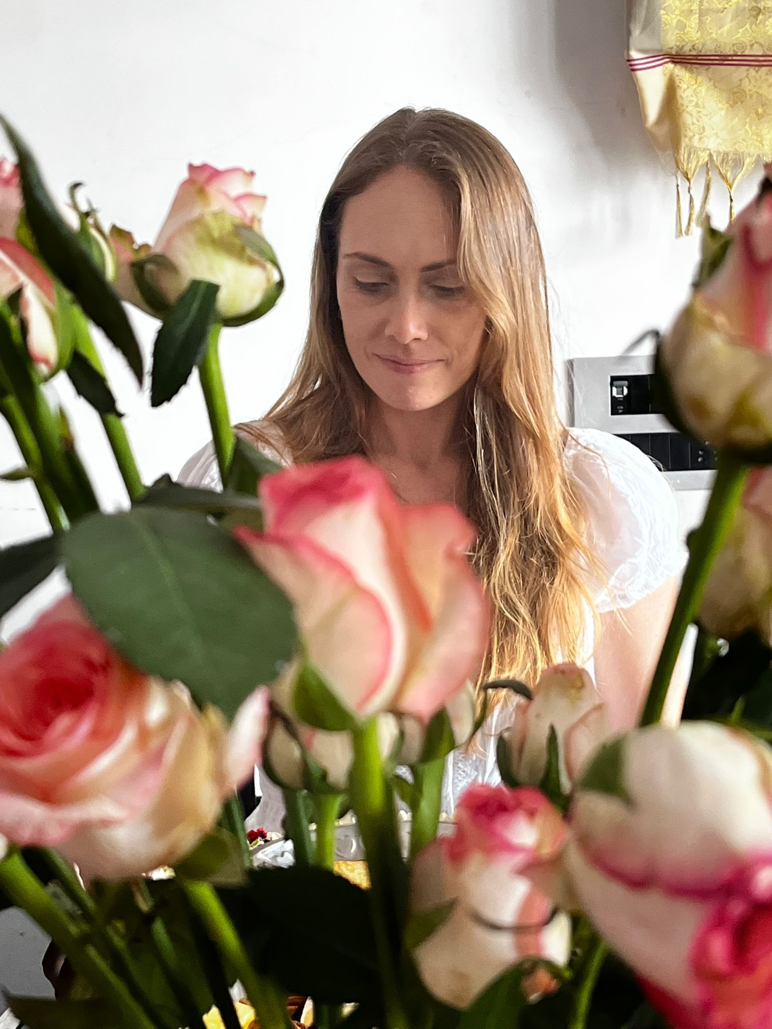 Overlapping landscape photo of a cooperative water-harvesting project with a multi-generational team inspecting systems at sunset, warm tones, high-quality editorial photography showing long-term vision and collaboration.