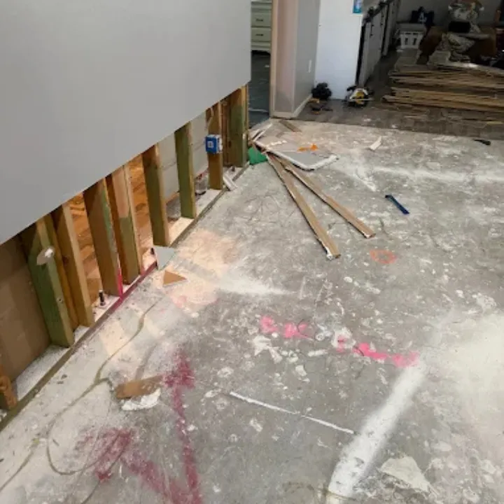 Water damage restoration water extraction and floor removal in a Murrieta CA home