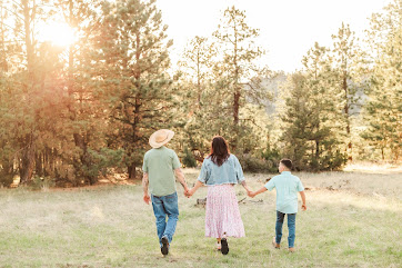 Family walking with animals at Cole Canyon Farm