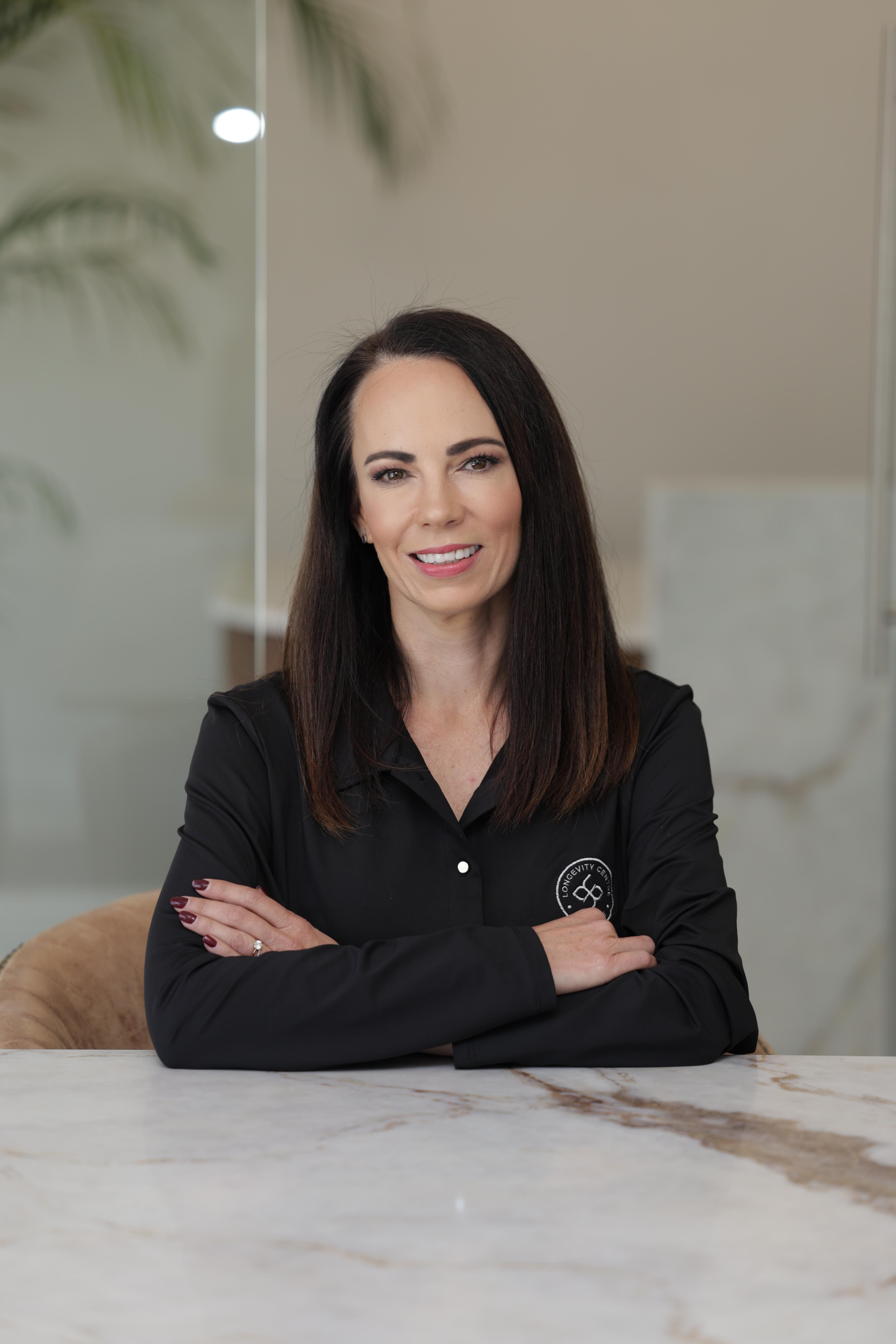 Portrait of the Pepto Meals host — a friendly registered dietitian mid-30s, smiling, neutral background, natural studio lighting, clean modern photographic style that highlights approachability and credibility.