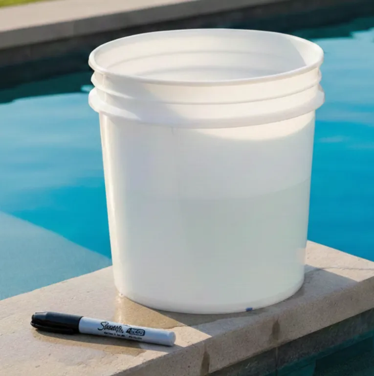 An instructional photo of a pool bucket test, showing how to use a marker to track water level changes over 24 hours to determine if loss is due to evaporation or a structural leak.