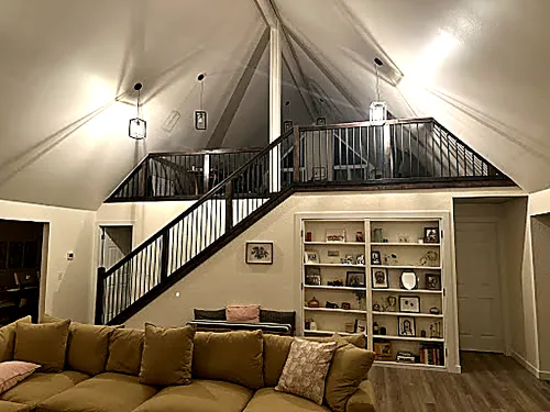 7 Angels Const. custom stairs, railings and laminate flooring in Black Diamond